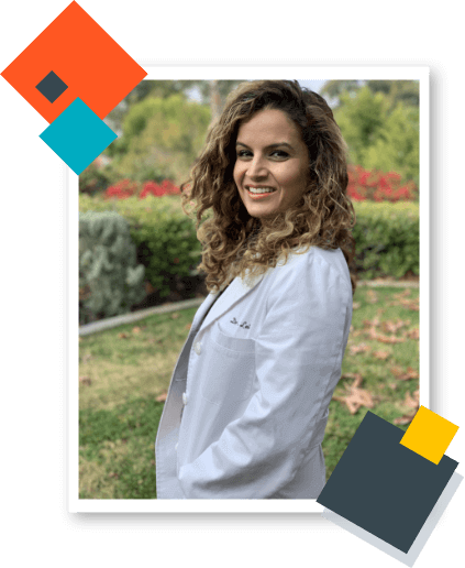 Dr. Leila Bozorgnia wearing white doctor's coat.